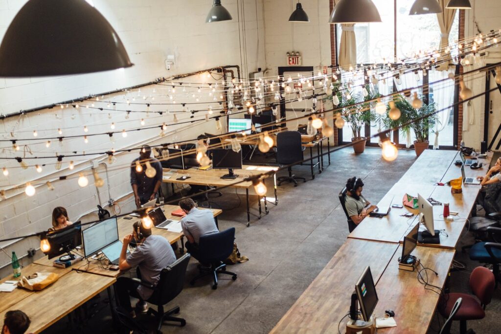 People work in a coworking space.
