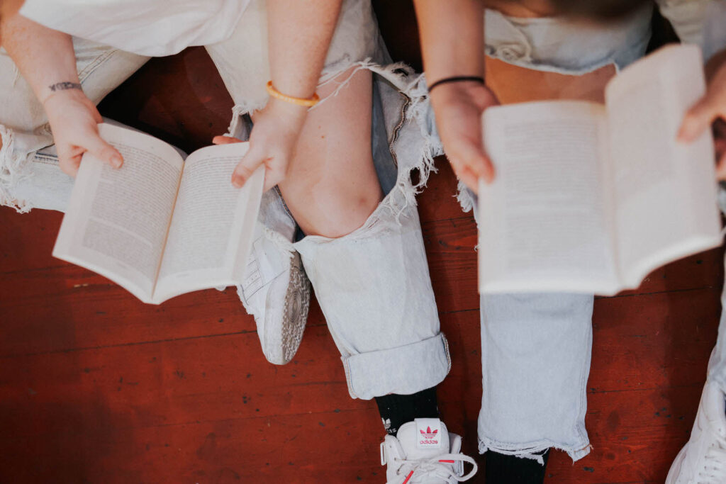 Jessie and KP read books from above.