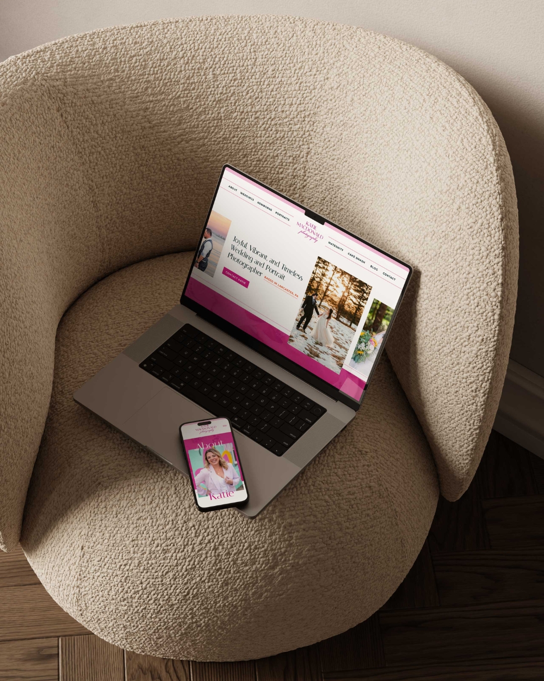 katie macdonald photography's website displayed on a laptop and mobile set against a brown chair