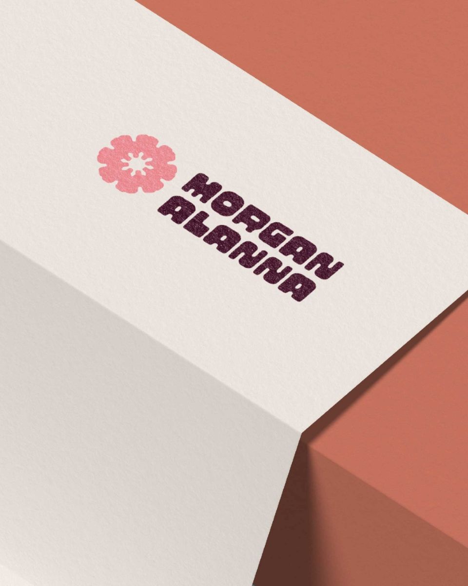 a sheet of paper with the logo for morgan alanna photography