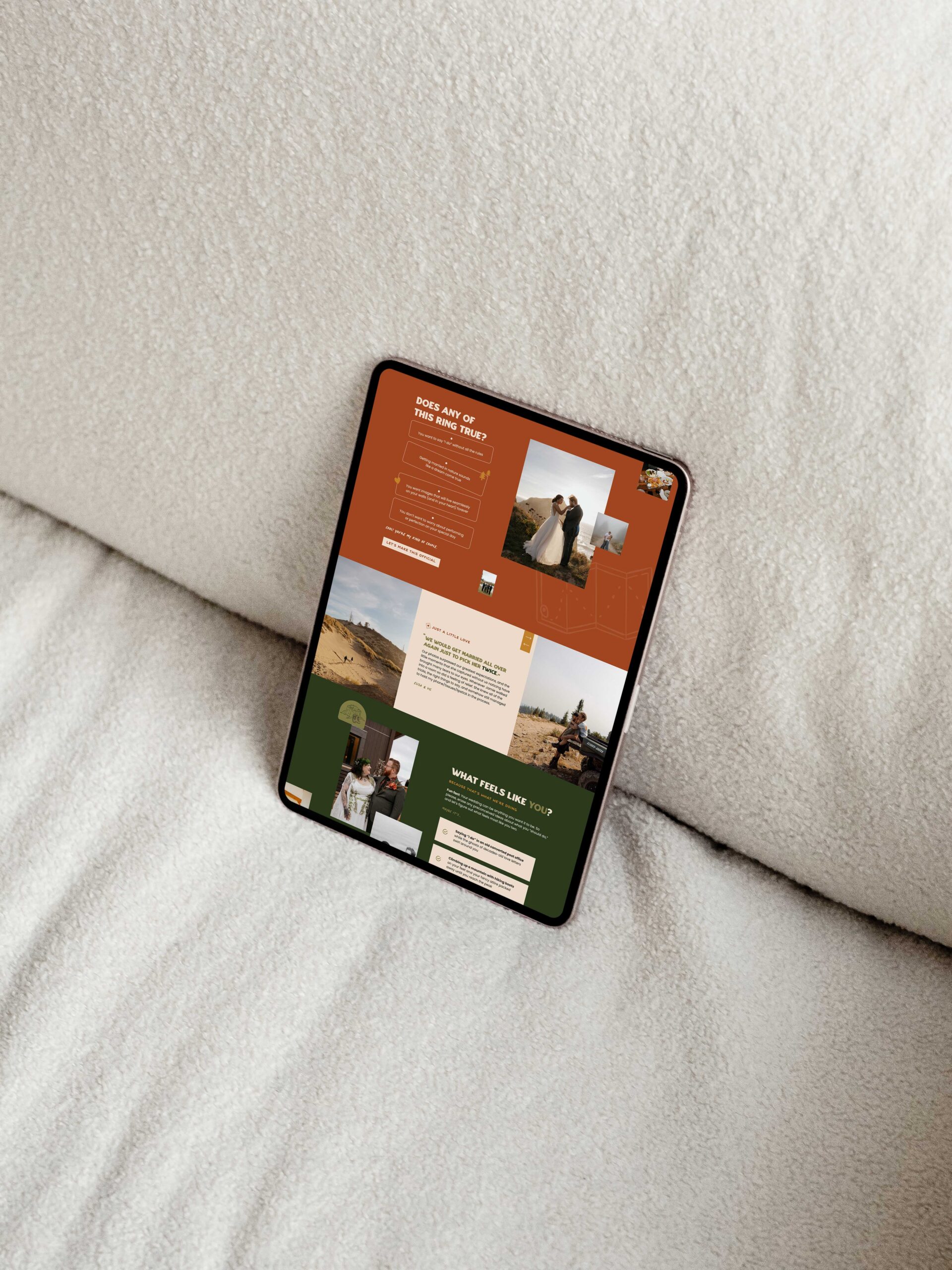 a tablet on a couch displaying a website for a photography business 