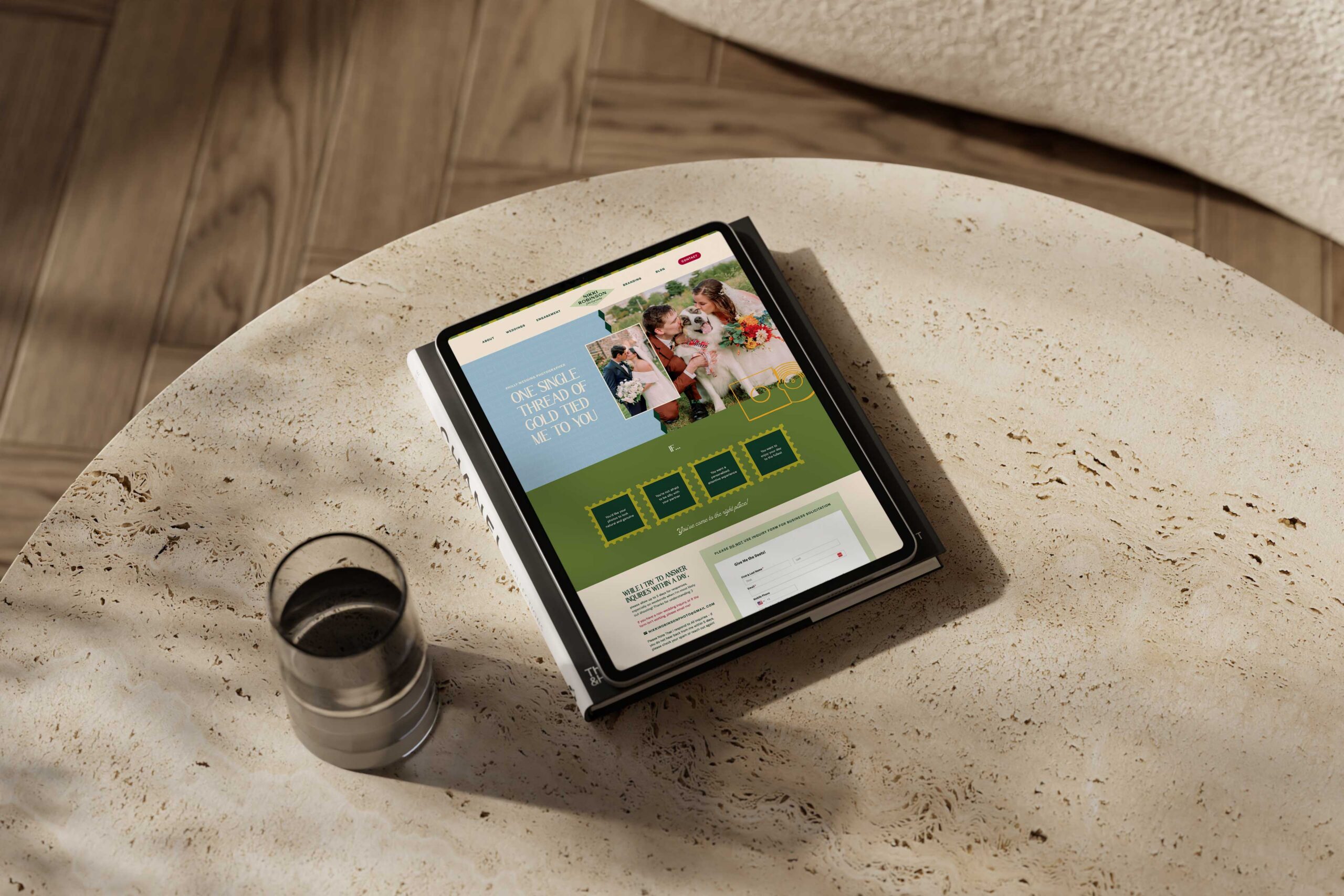 a tablet with a website pulled up on top of a marble table 
