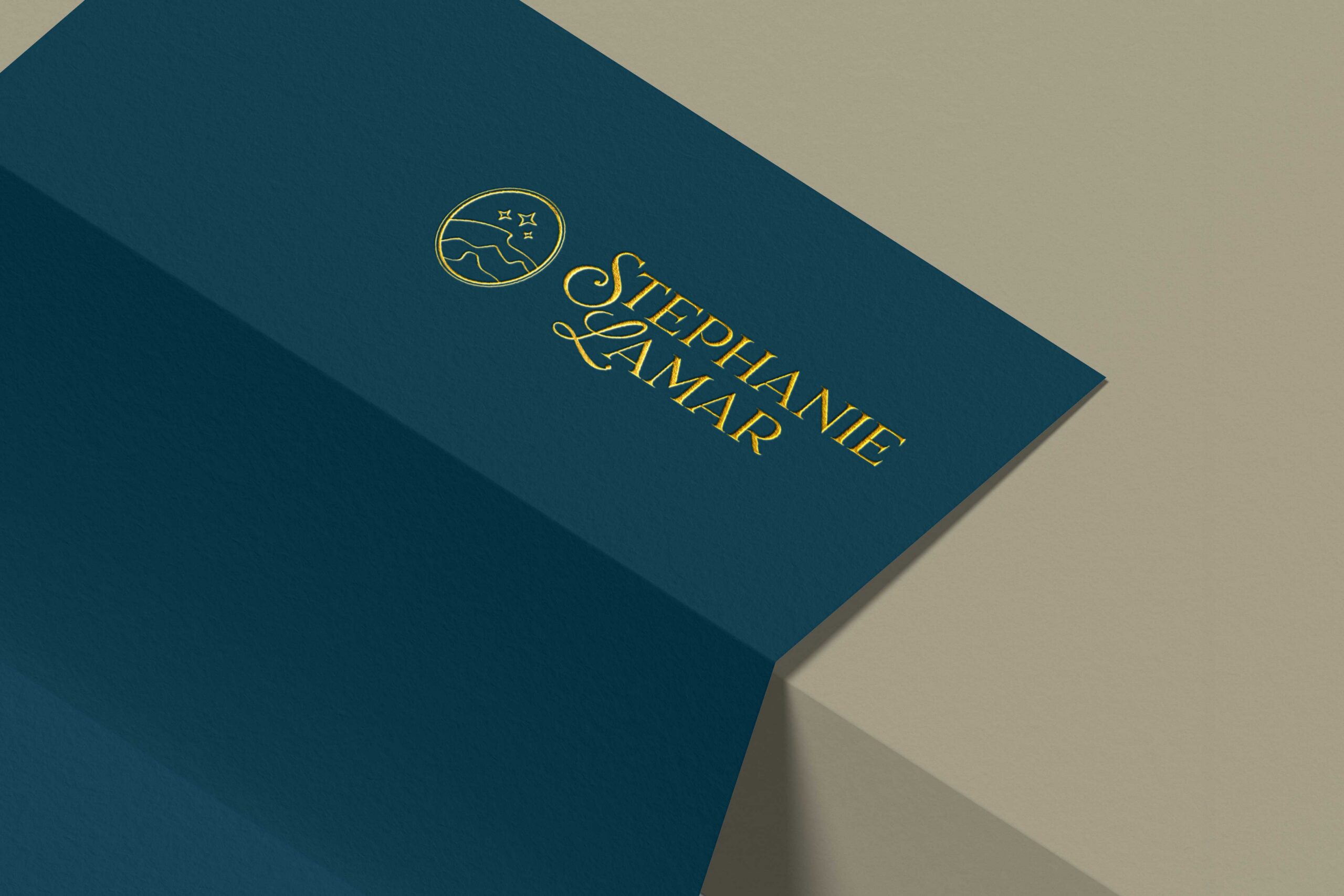 a logo for stephanie lamar photography on blue letterhead