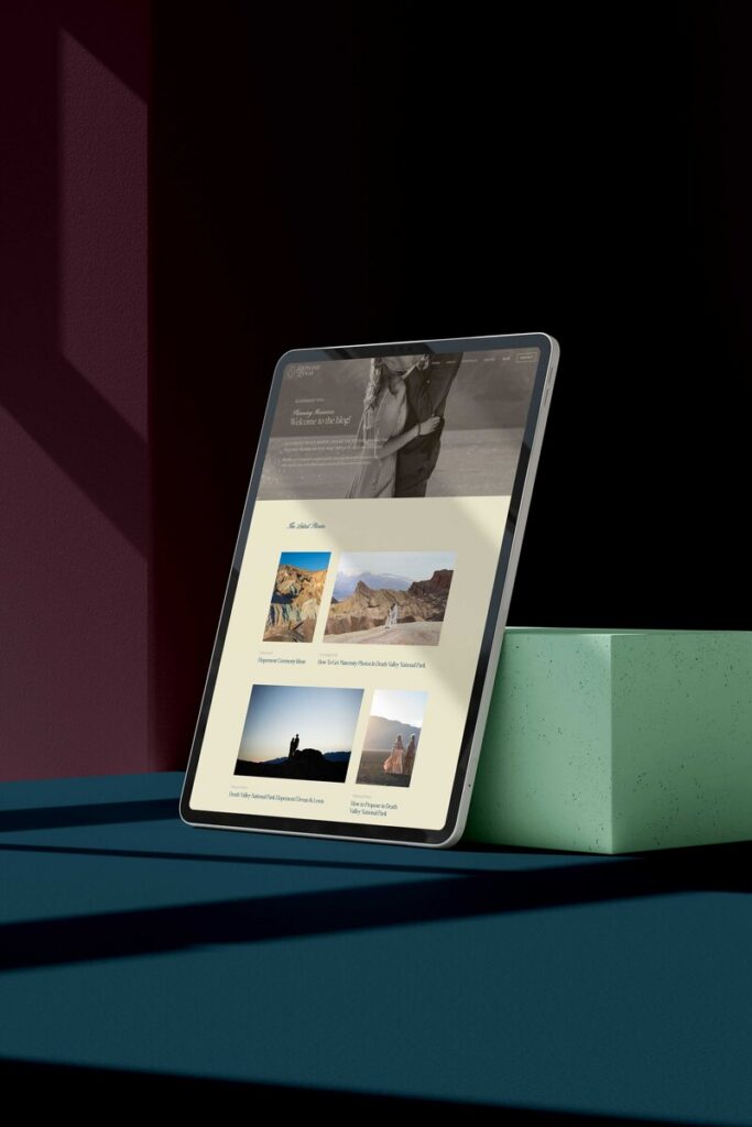 a tablet set against a green box the tablet is displaying a website for stephanie lamar photography