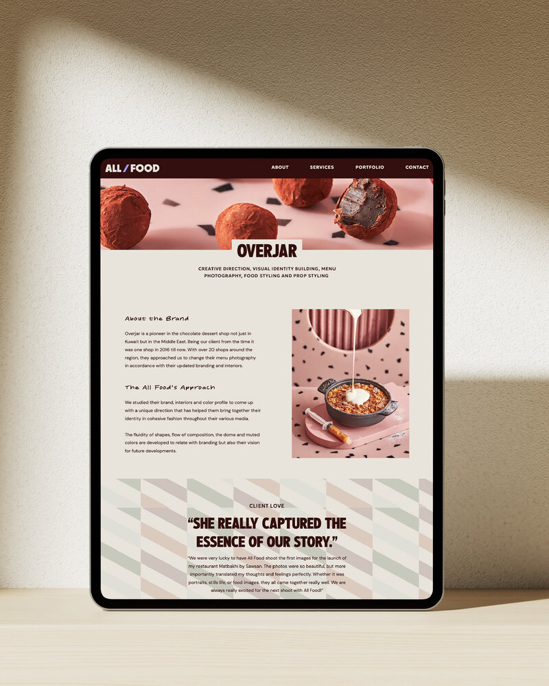 a tablet displaying a website page for all food 