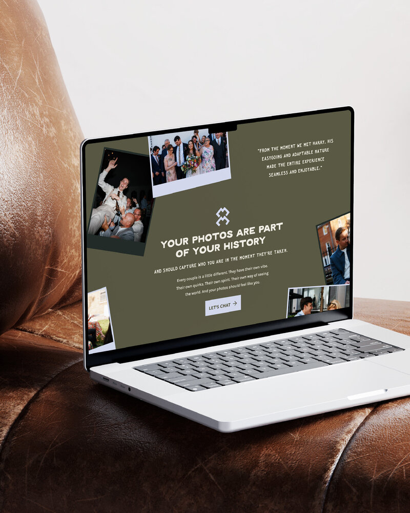 a laptop on a leather couch displaying the website for harry goldman photography