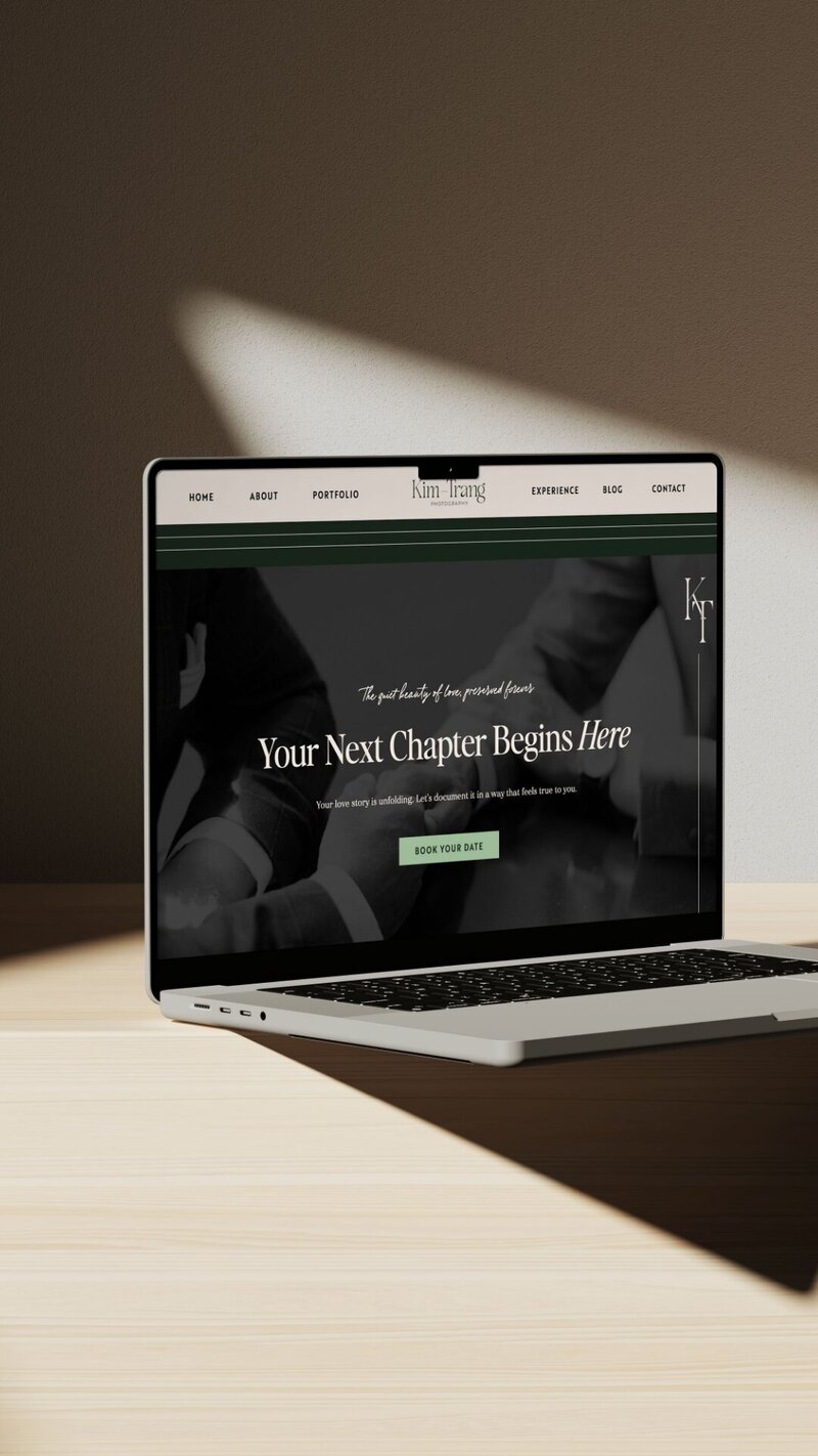 a laptop displaying the website for kim trang photography