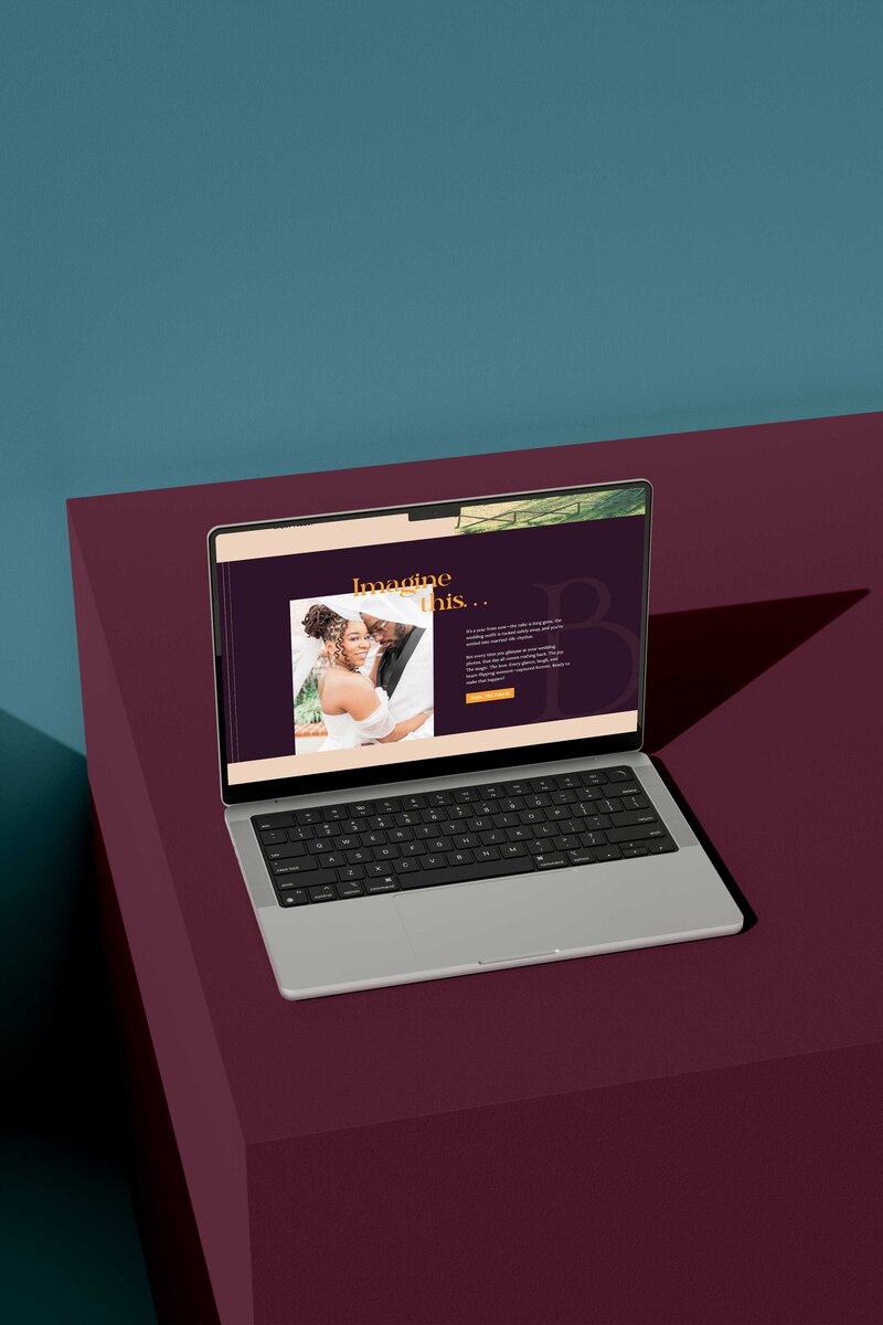 a laptop on top of a purple table displaying the website for bri ellington photography