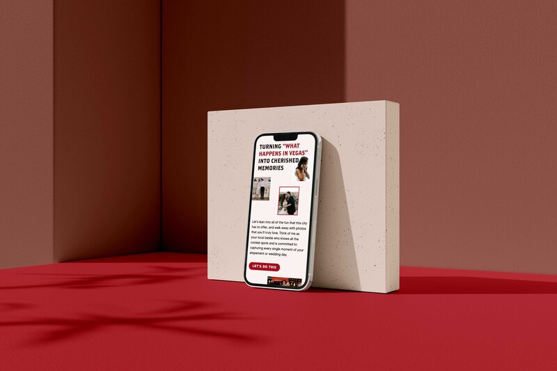 a phone displaying a website propped against a marble slab 