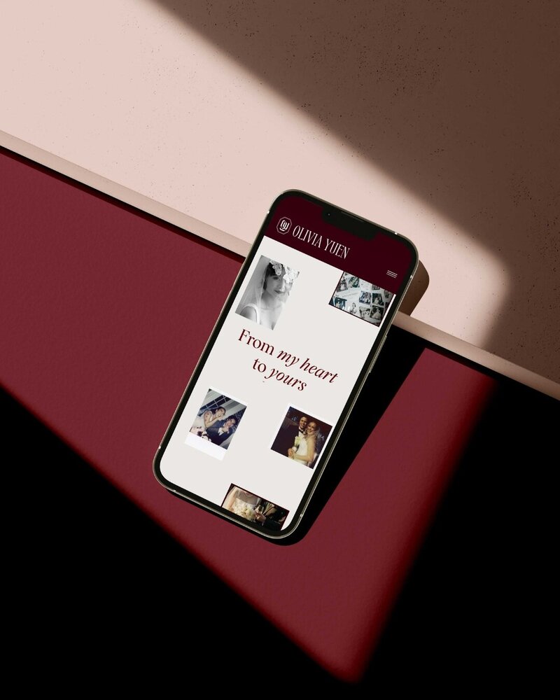a mobile phone displaying the website for olivia yuen photography