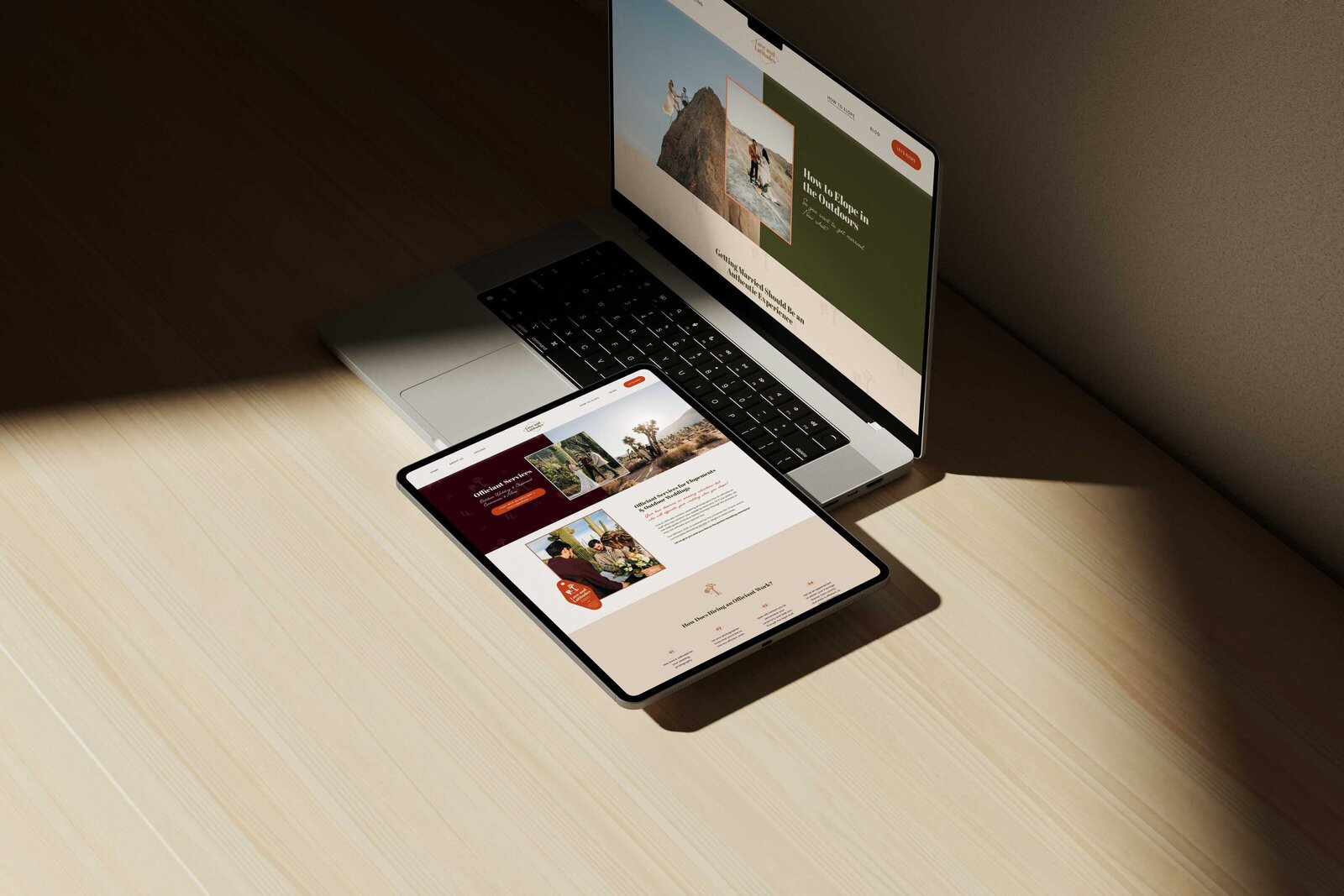a tablet and laptop displaying the website for love and latitudes photography