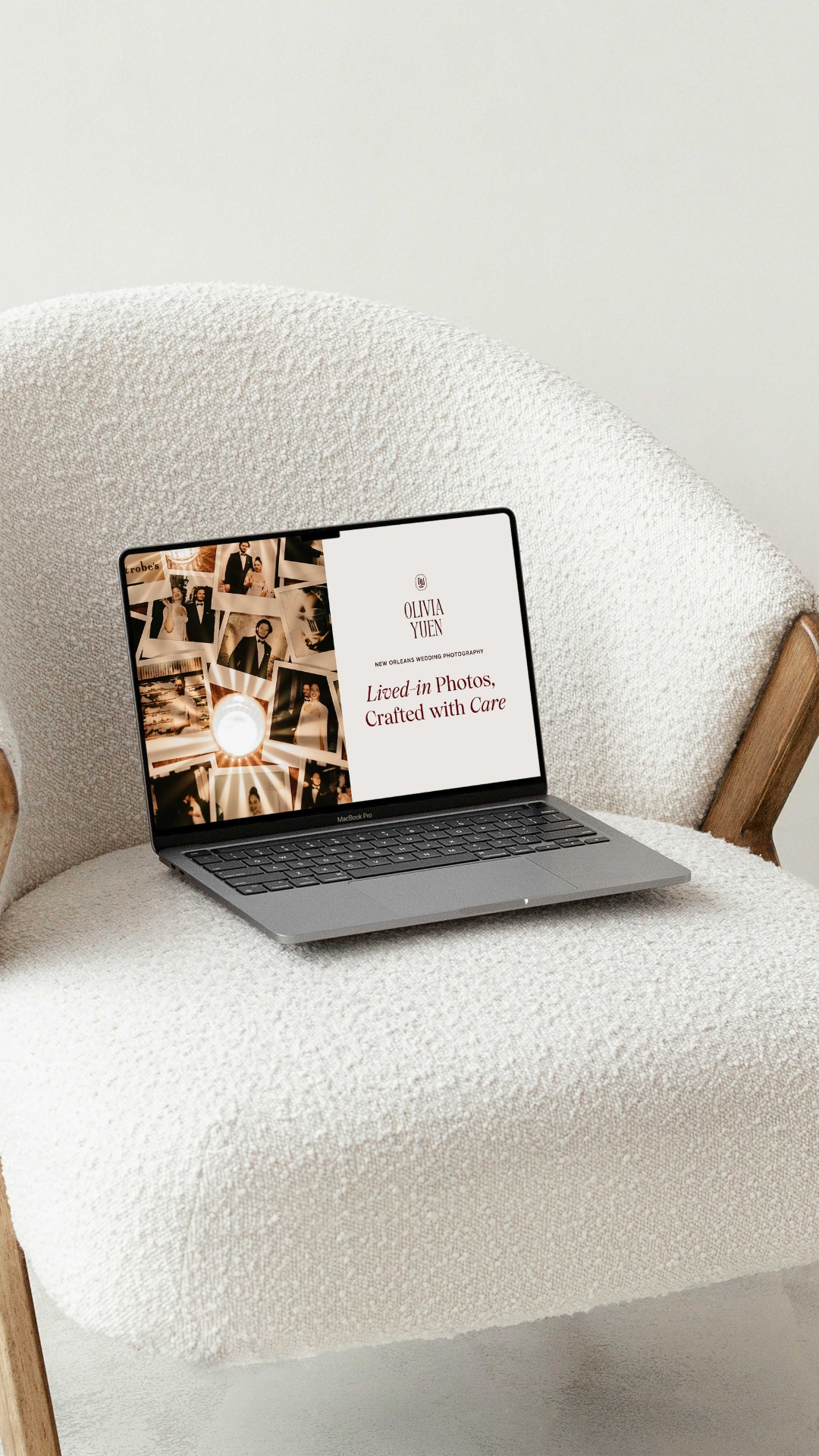 a laptop on a white chair displaying the website for olivia yuen photography