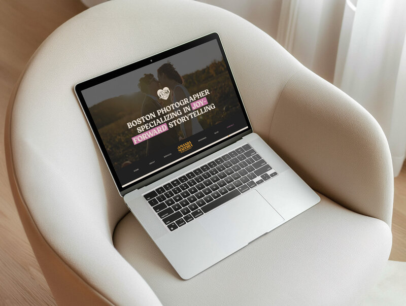 a laptop displaying Mio Sison Studio's website the laptop is on top of a white chair 