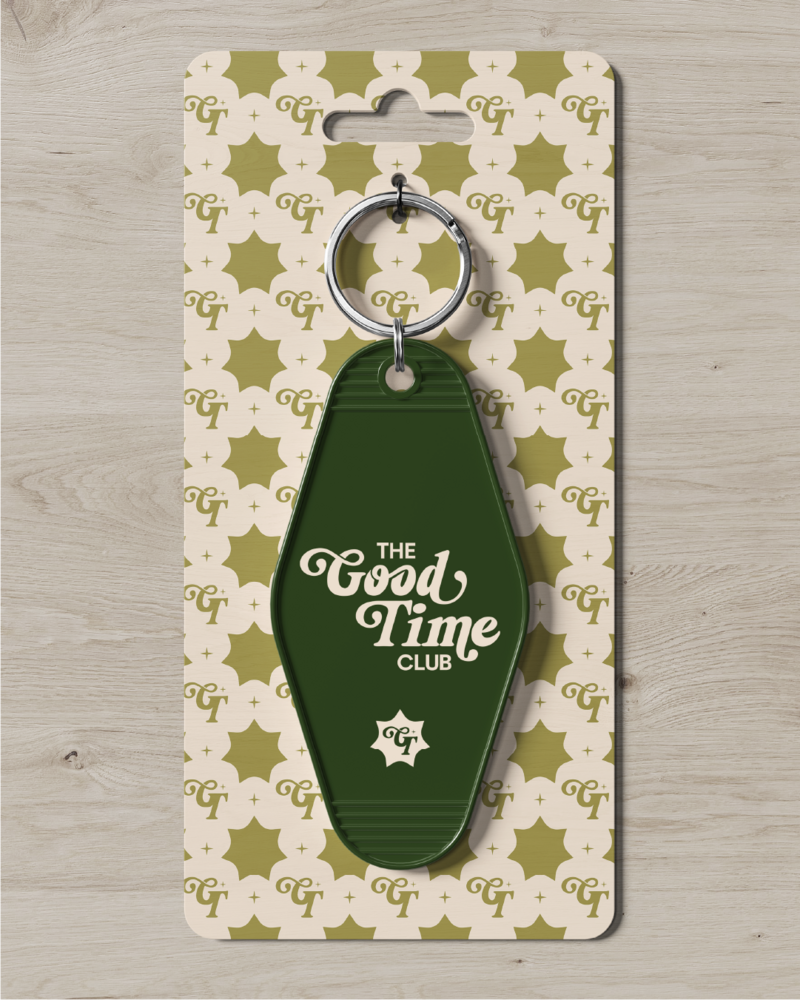 a keychain with the good time club's logo on it 