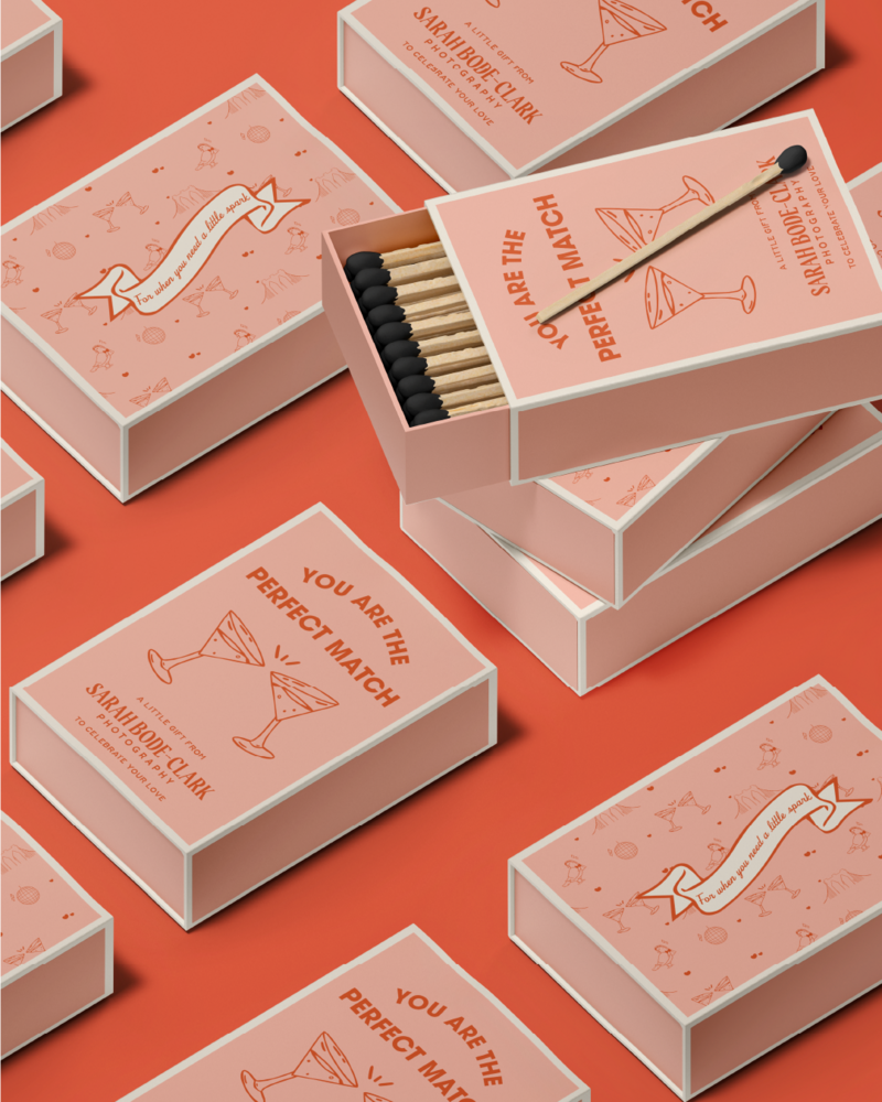 match boxes with sarah bode clark photography's logo on them 