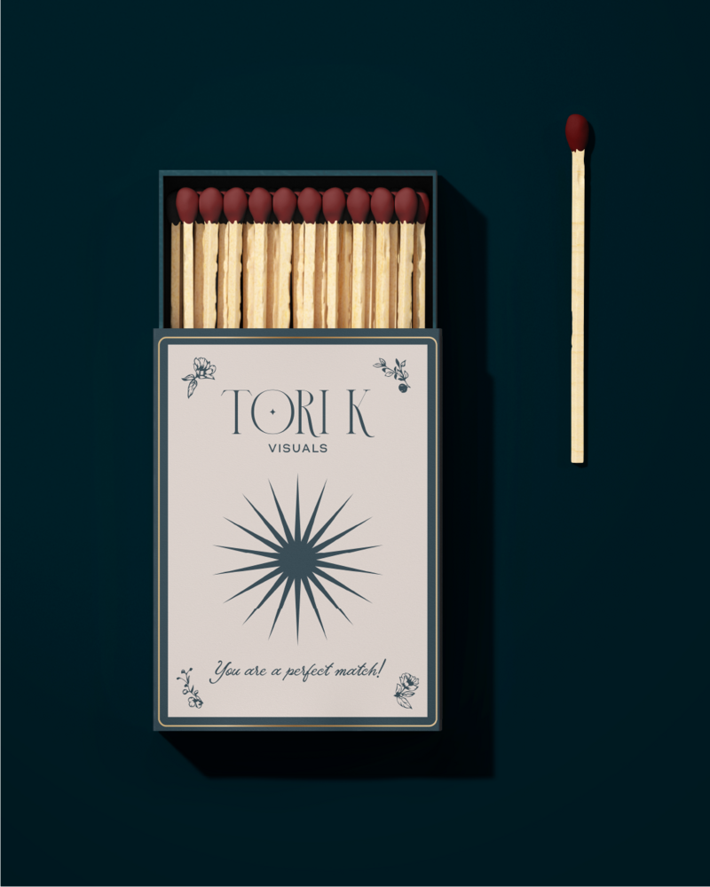 a matchbox with a logo on it for tori k visuals 