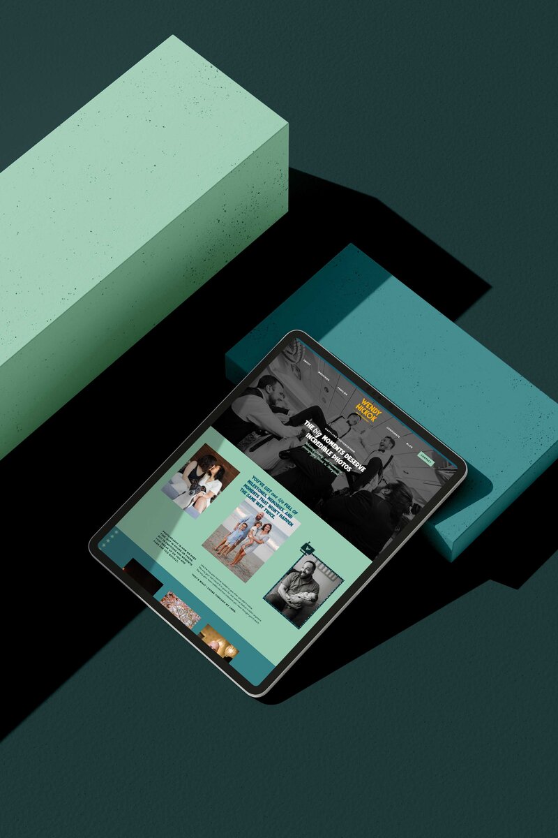 a tablet displaying the website for wendy hickok photography