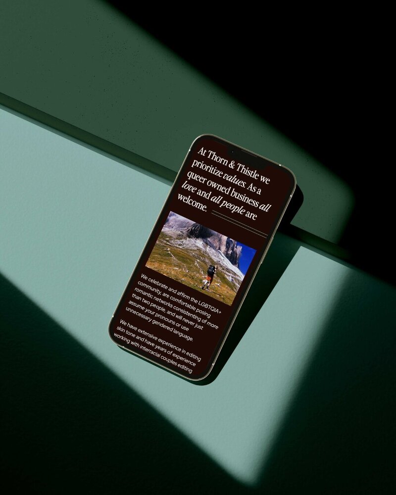 a mobile phone displaying the website for thorn and thistle 