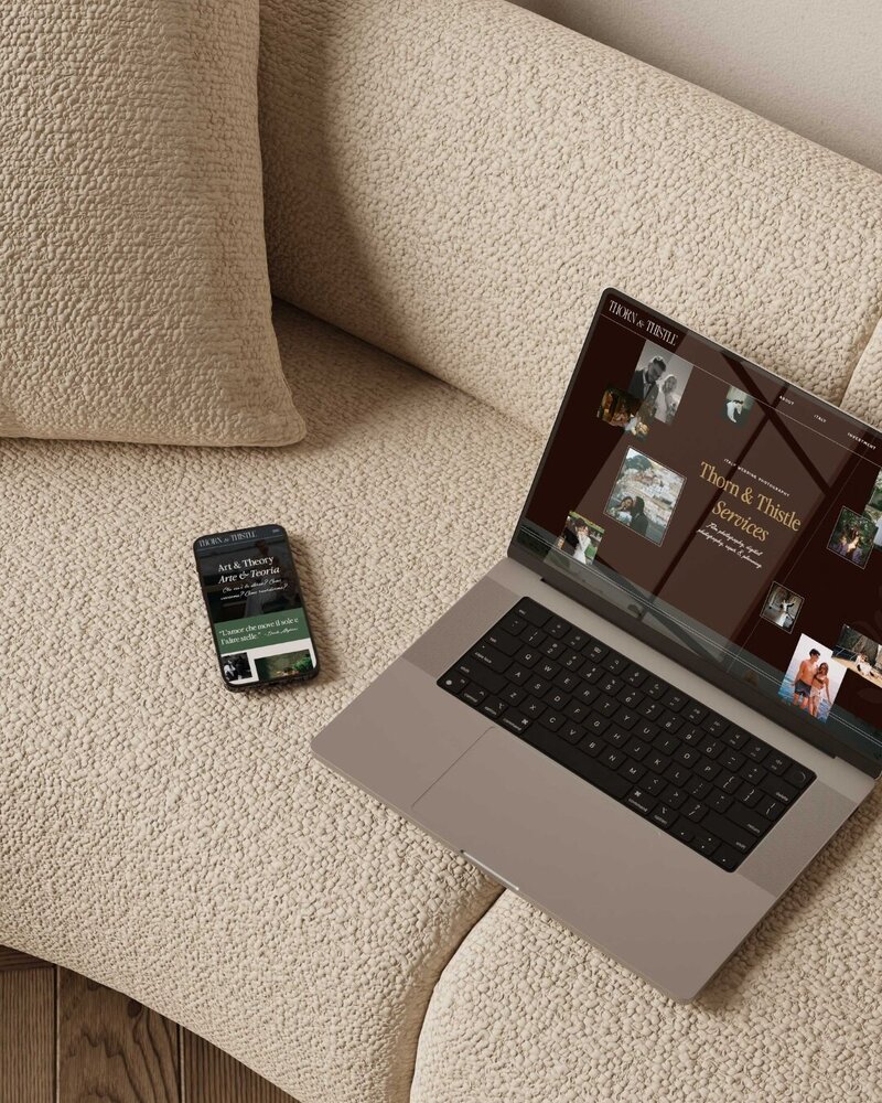 a laptop and mobile phone displaying the website for thorn and thistle 