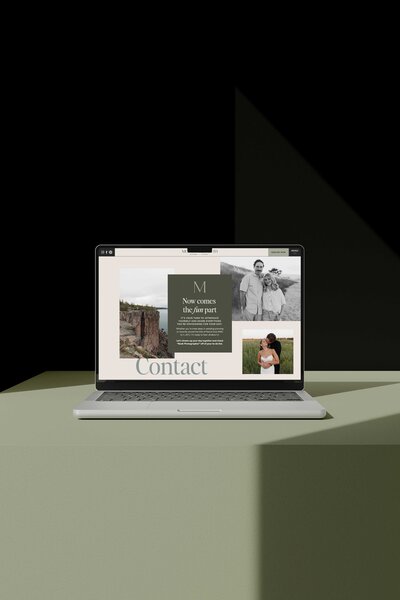 a laptop displaying the website for morgan elizabeth photography