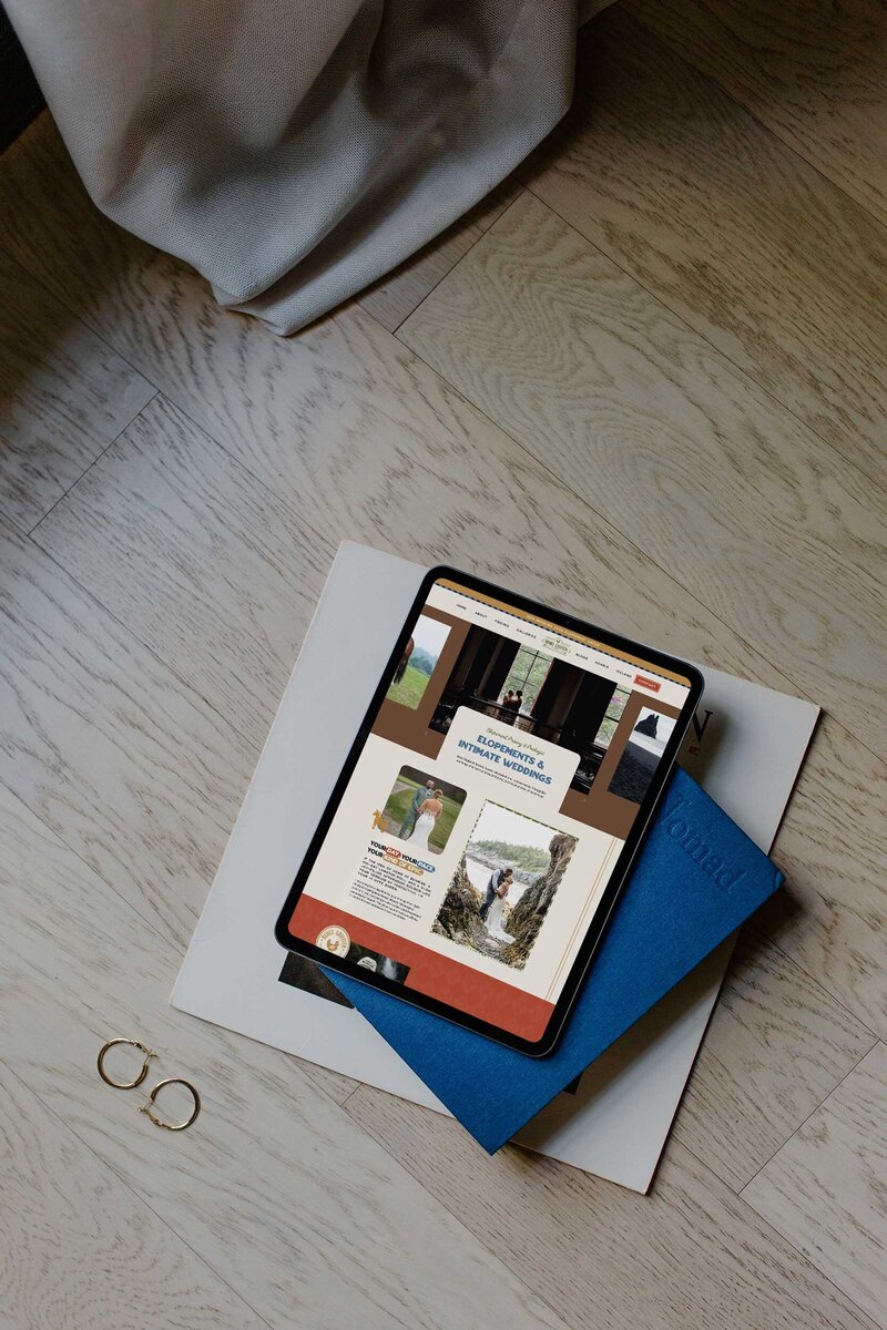 a tablet on the ground displaying the website for renee griffith photo 