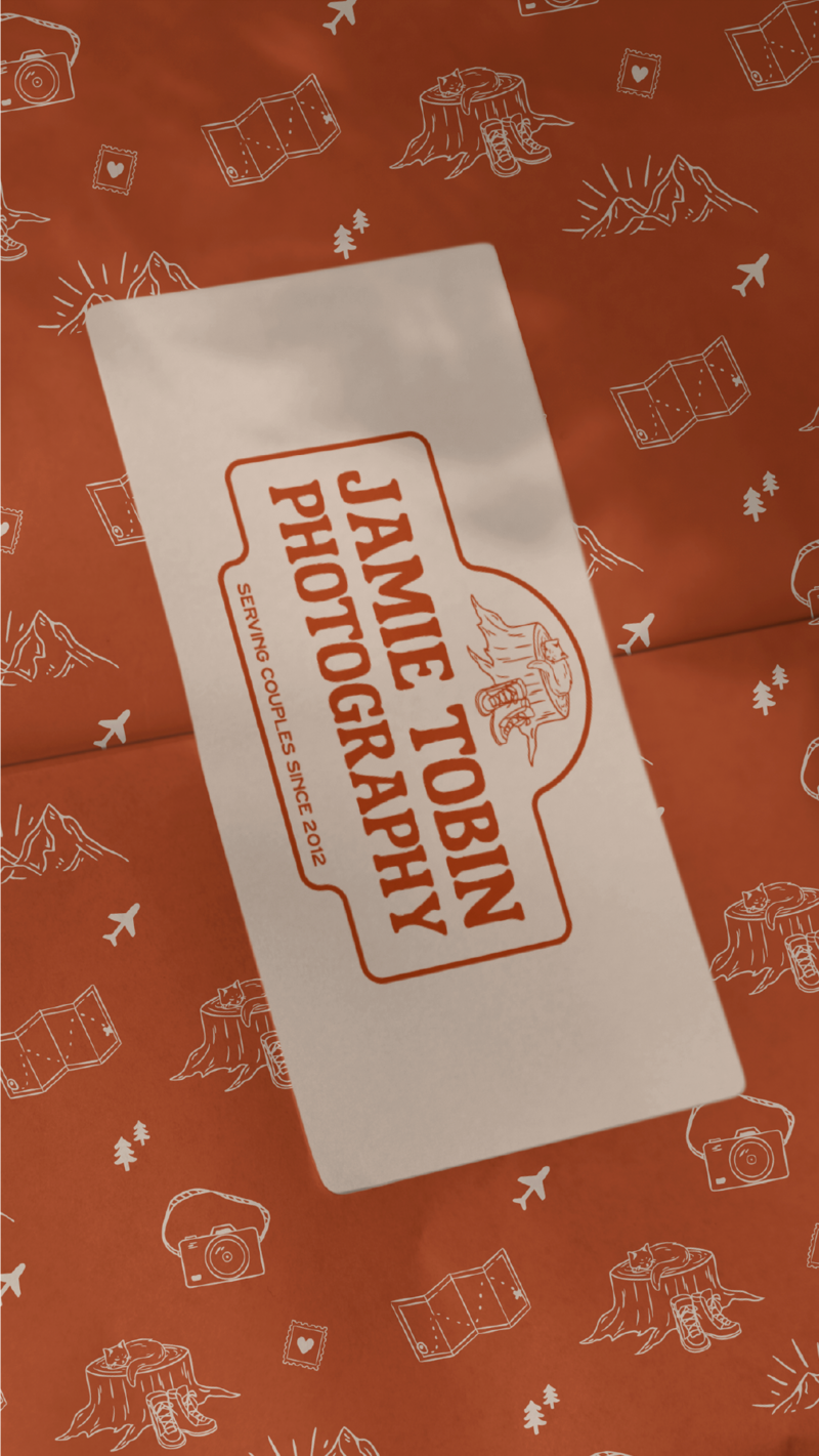 branded wrapping paper and the logo for jamie tobin photography